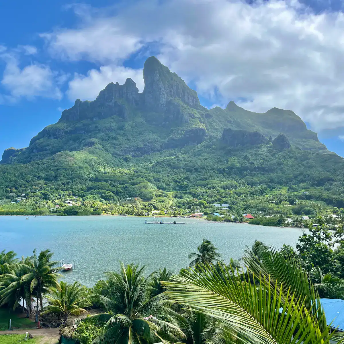 Tropical lagoon and volcanic mountain representing Australia and Oceania, photographed in Bora Bora, French Polynesia