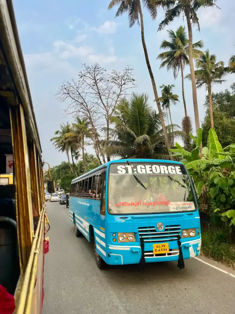 Local bus driving through the streets of Kerala, India