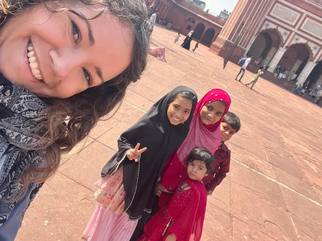 Photo with local children in front of Jama Masjid, Delhi