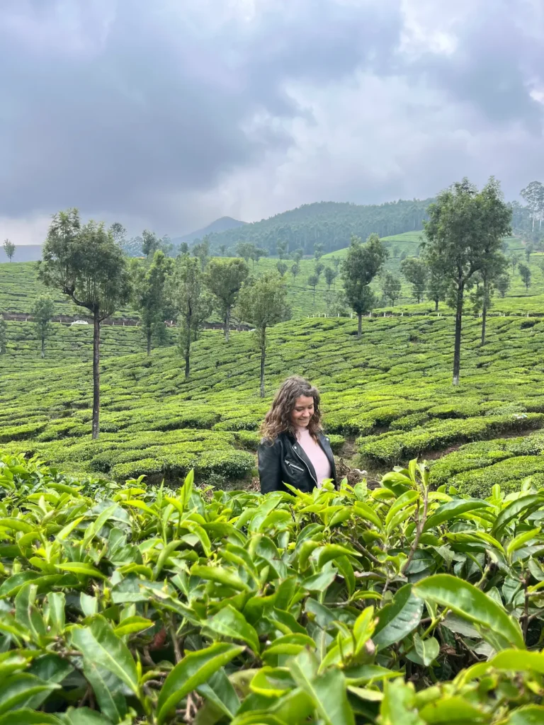 Solo female traveler in Munnar Tea plantation, Kerala, India
